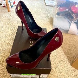 Like new Authentic reddish/burgundy patent leather Gucci Heels. Approx 4”.